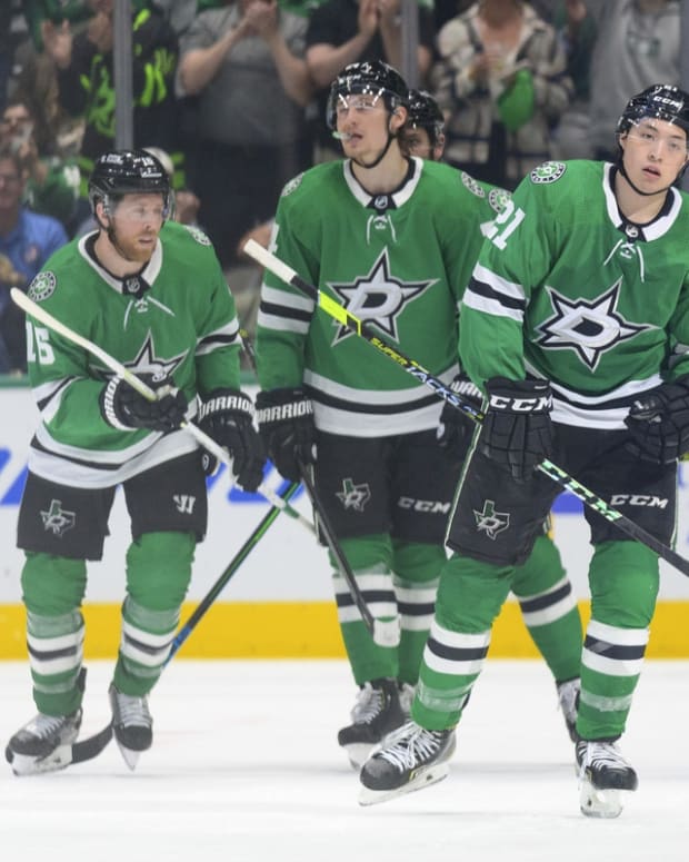 Apr 29, 2022; Dallas, Texas, USA; Dallas Stars center Joe Pavelski (16) and center Roope Hintz (24) and left wing Jason Robertson (21) and defenseman Miro Heiskanen (4) skate off the ice after Robertson scores the game winning goal against the Anaheim Ducks during the third period at the American Airlines Center. Mandatory Credit: Jerome Miron-USA TODAY Sports